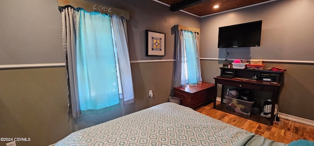 bedroom featuring hardwood / wood-style flooring and wooden ceiling