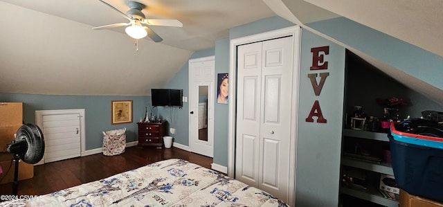 bedroom featuring dark wood-type flooring, ceiling fan, and lofted ceiling