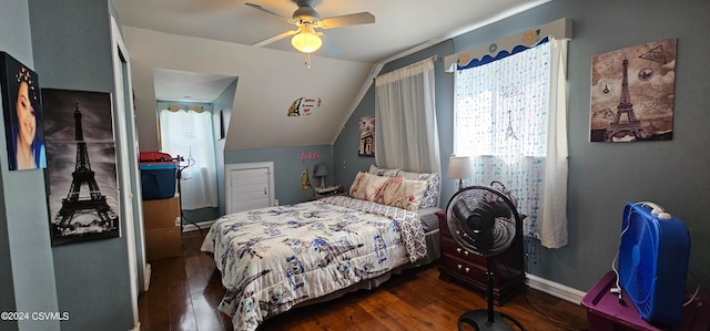 bedroom with ceiling fan, dark hardwood / wood-style floors, and lofted ceiling