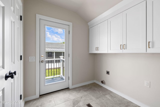 laundry room featuring cabinets and electric dryer hookup