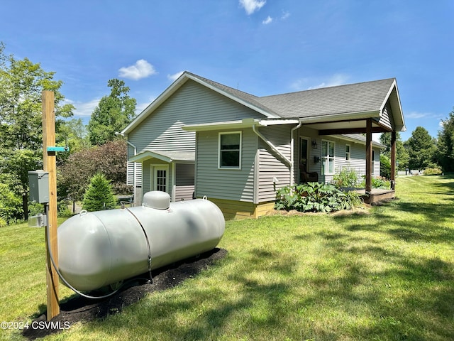 view of property exterior with a lawn