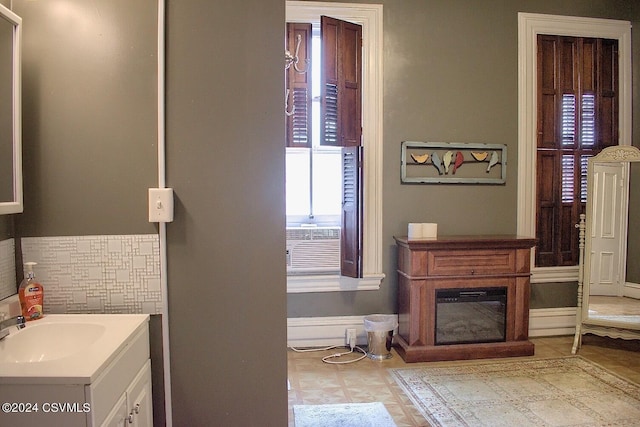 bathroom with vanity and cooling unit