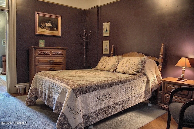 bedroom featuring hardwood / wood-style flooring