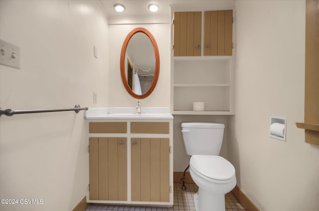 bathroom with toilet and vanity