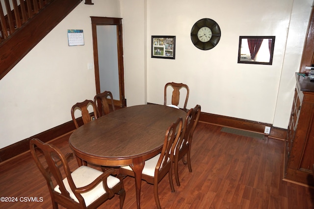 dining room featuring dark wood-type flooring