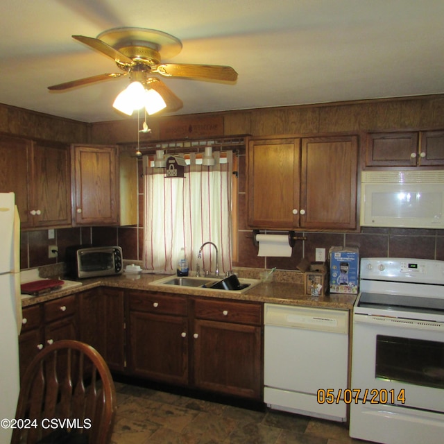 kitchen featuring a sink, white appliances, a toaster, decorative backsplash, and ceiling fan