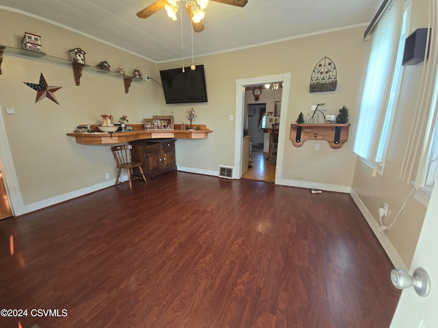 unfurnished living room with ceiling fan, crown molding, and dark hardwood / wood-style flooring