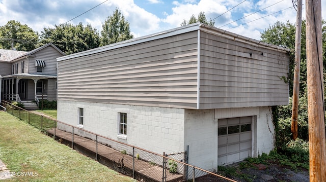 view of property exterior featuring a garage