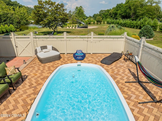 view of pool with a patio area