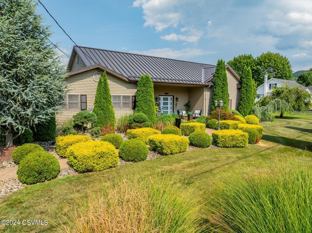 exterior space with a lawn