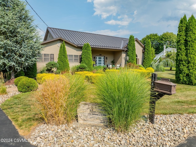 view of property exterior featuring a yard