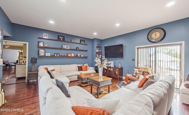 living room featuring dark wood-type flooring