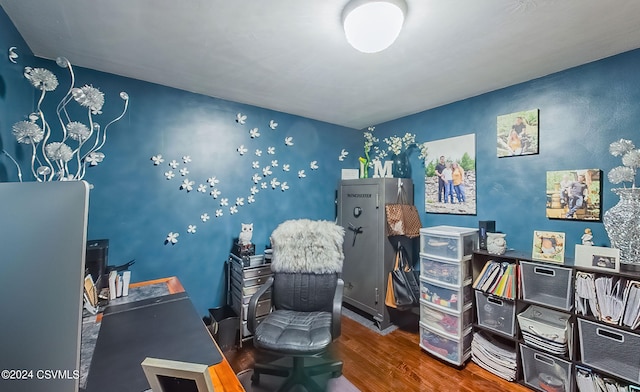 home office with hardwood / wood-style floors