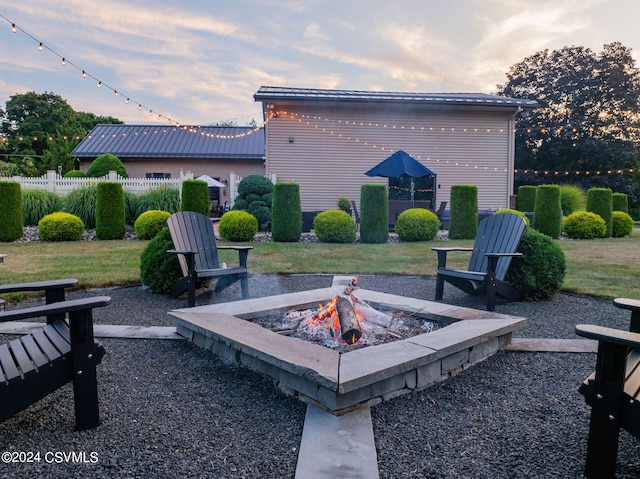 view of patio / terrace featuring a fire pit