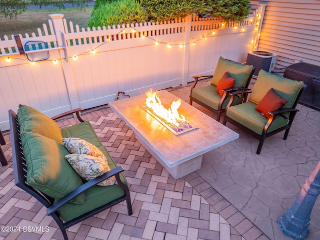 view of patio featuring an outdoor fire pit