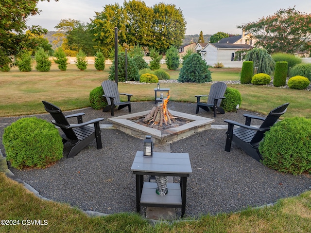 view of patio / terrace with an outdoor fire pit