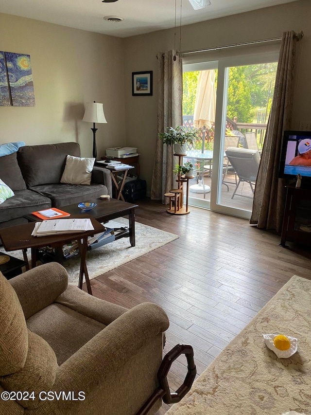 living room with hardwood / wood-style floors