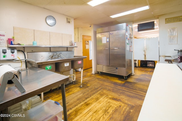 kitchen featuring a paneled ceiling and stainless steel built in refrigerator