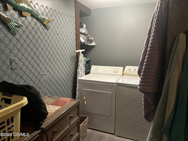 laundry area with separate washer and dryer