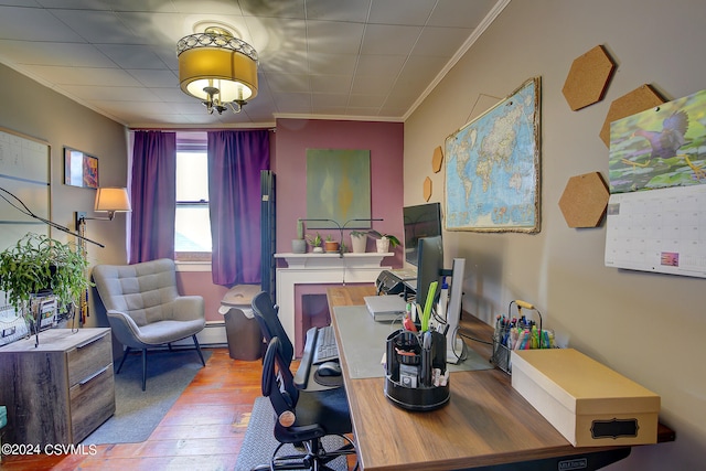 office area with crown molding and hardwood / wood-style floors