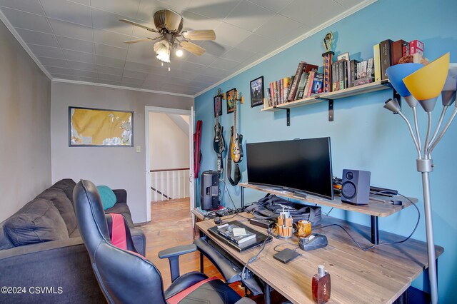 office area with ornamental molding, hardwood / wood-style flooring, and ceiling fan