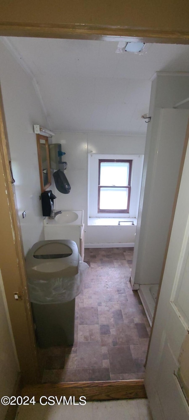 bathroom with vanity and walk in shower