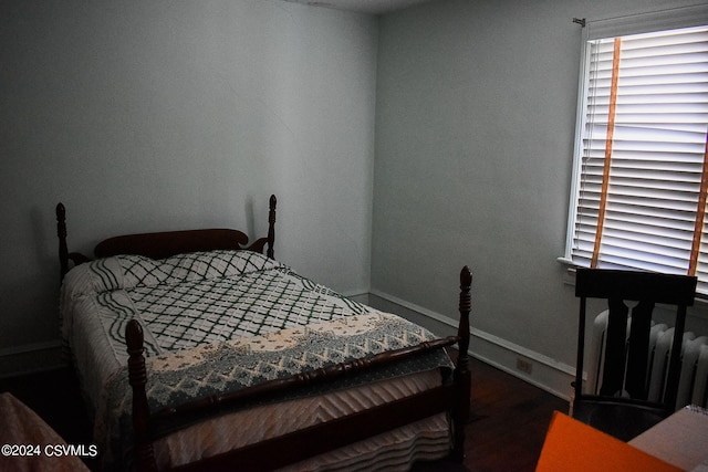 bedroom featuring hardwood / wood-style floors