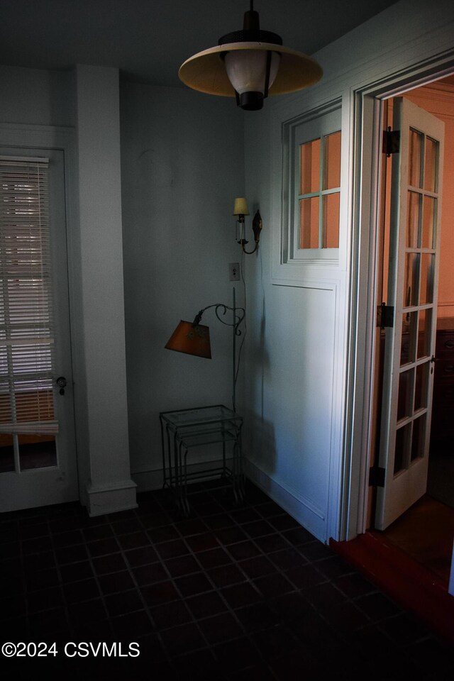 corridor with tile patterned floors