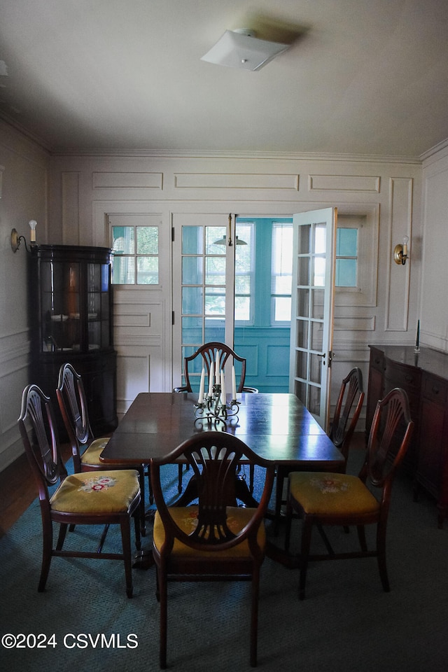 dining area featuring wood-type flooring