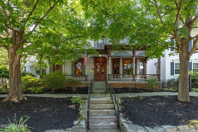 view of front of home featuring covered porch