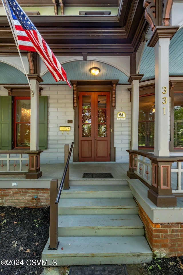 entrance to property with covered porch