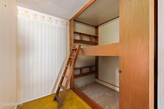 stairs featuring hardwood / wood-style flooring