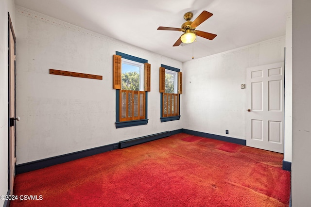 carpeted spare room with ceiling fan and baseboard heating