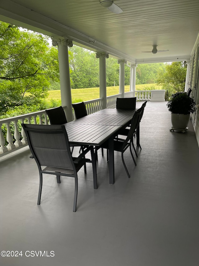 view of patio featuring ceiling fan