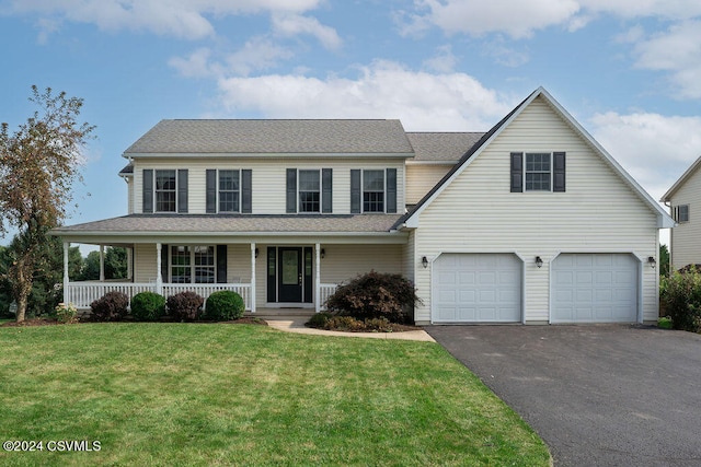 view of front of property featuring a front lawn and a porch