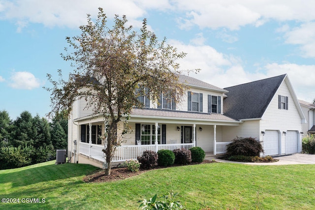 view of front of property featuring a porch, central air condition unit, a garage, and a front lawn