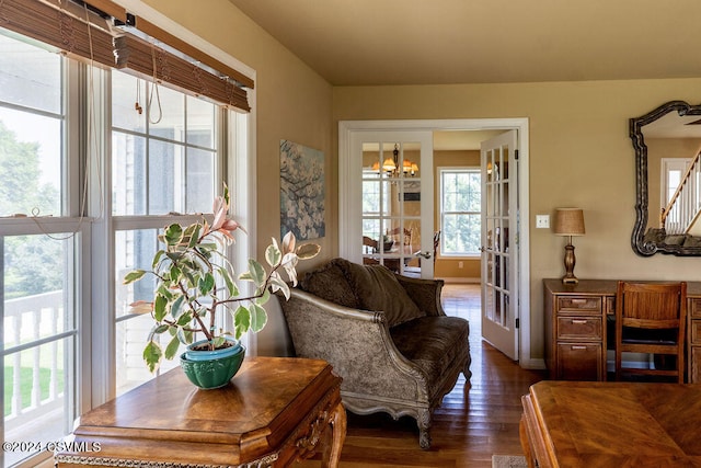 living room with dark hardwood / wood-style floors