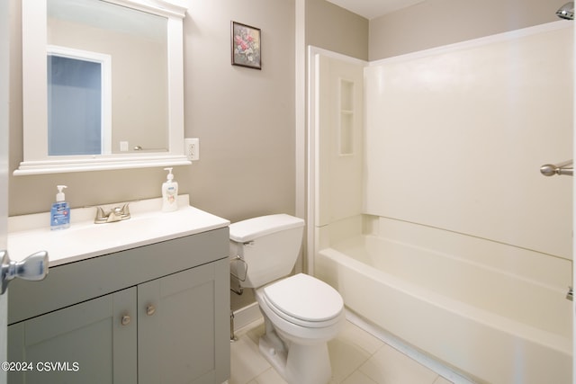 full bathroom featuring tile patterned flooring, toilet, vanity, and bathtub / shower combination