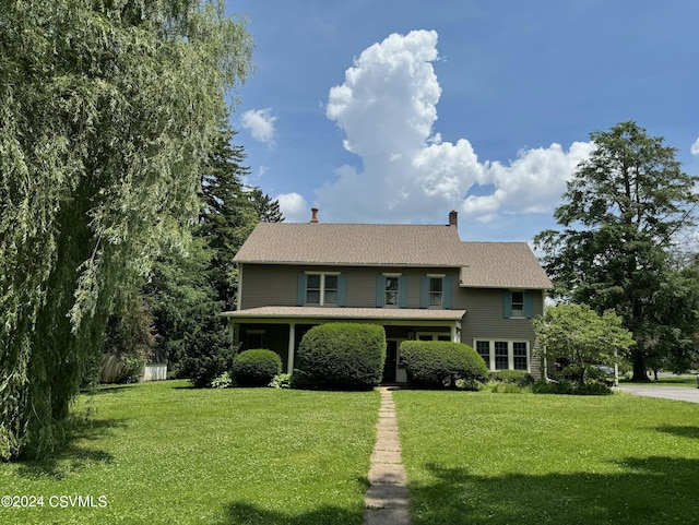 view of front of house with a front lawn