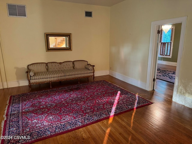 sitting room with hardwood / wood-style floors