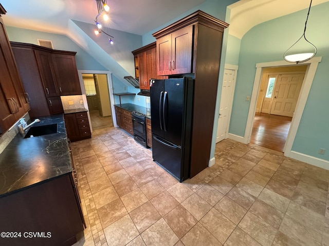 kitchen featuring black appliances, sink, pendant lighting, and vaulted ceiling