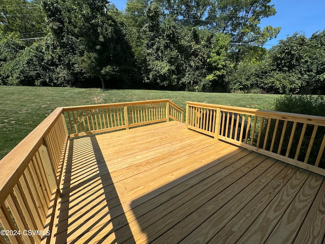 wooden deck with a yard