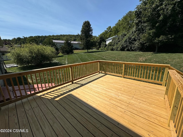 deck featuring a yard