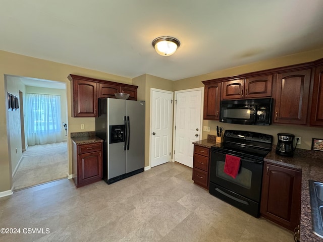 kitchen featuring black appliances