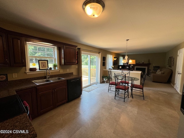 kitchen featuring dark brown cabinets, an inviting chandelier, sink, hanging light fixtures, and black dishwasher