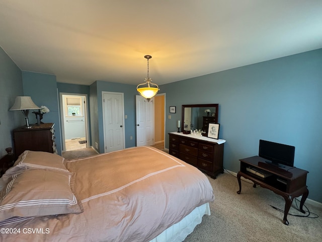 bedroom with light carpet