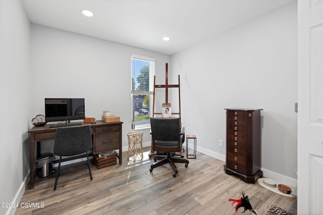 home office featuring light hardwood / wood-style floors