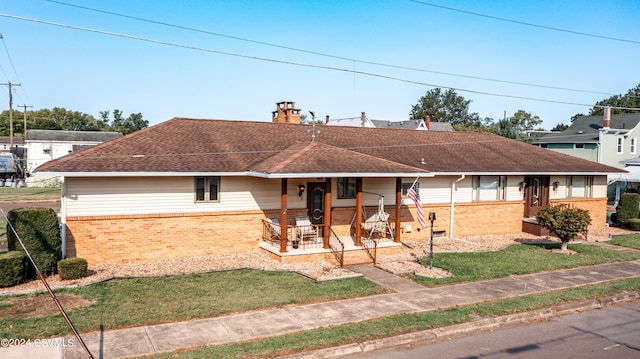 ranch-style home with a porch