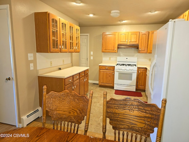 kitchen featuring white appliances, a baseboard radiator, and light hardwood / wood-style floors