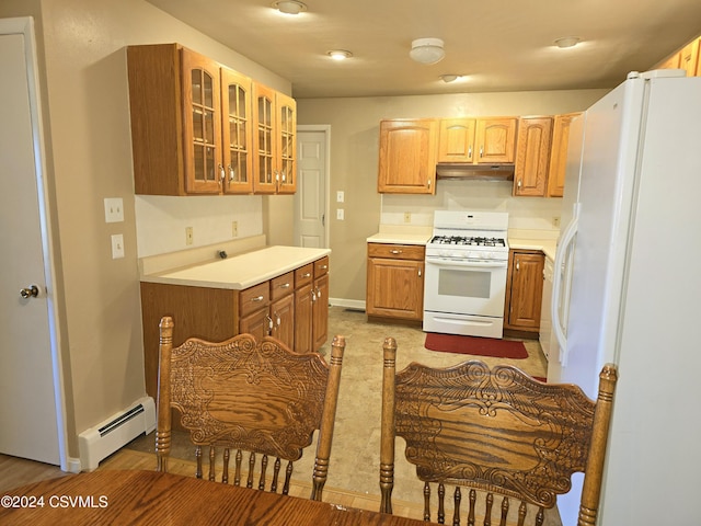 1000 E 6th St, Berwick, PA 18603 - kitchen featuring light countertops, a baseboard heating unit, white appliances, under cabinet range hood, and glass insert cabinets